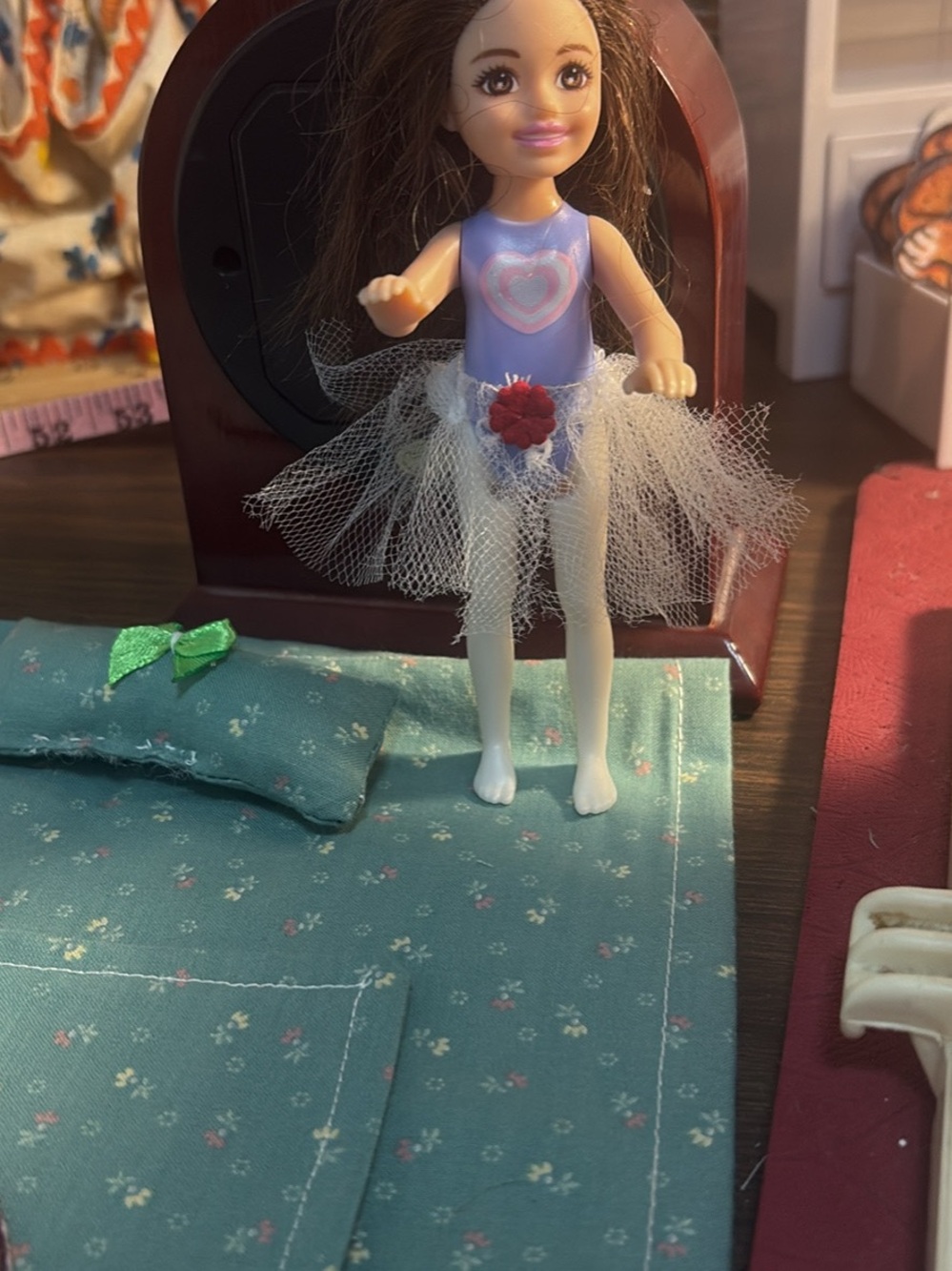 Mini Fashion Doll in Purple Bodysuit with White Tulle Skirt includes bedding